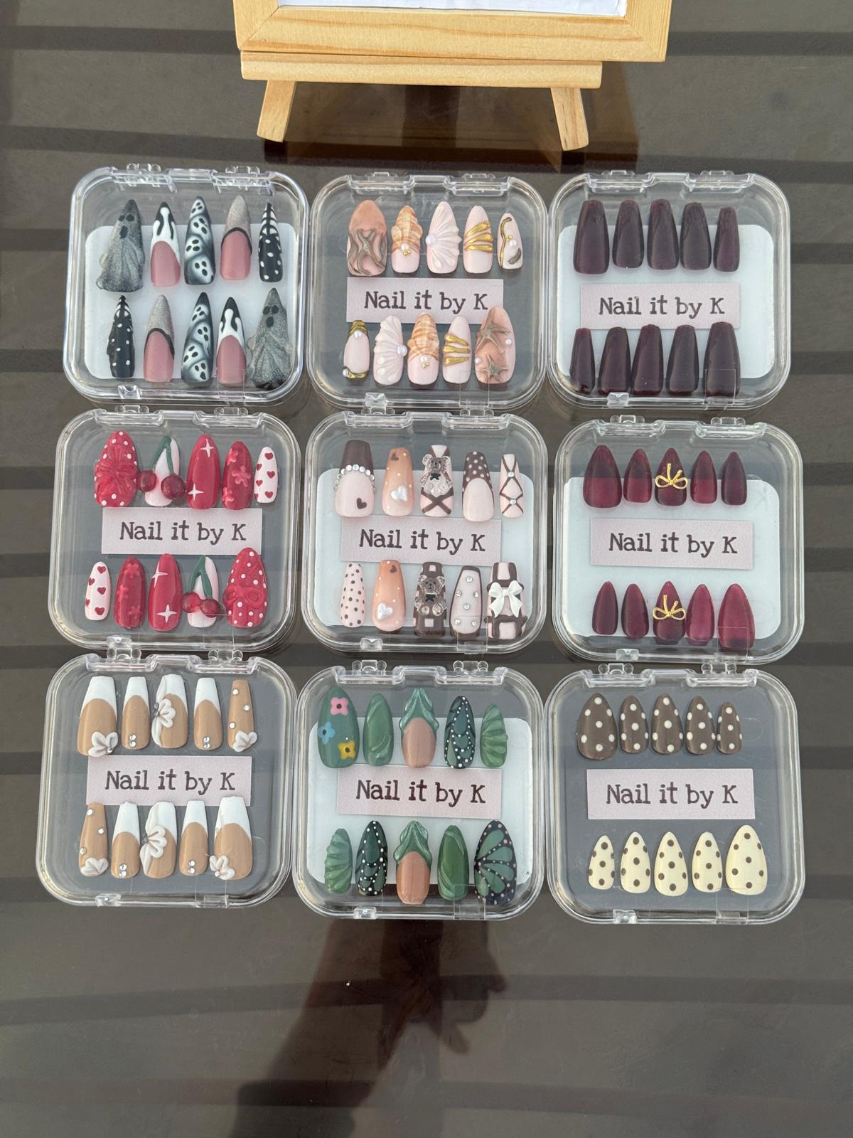 Nail it by K collection — nine custom press-on sets