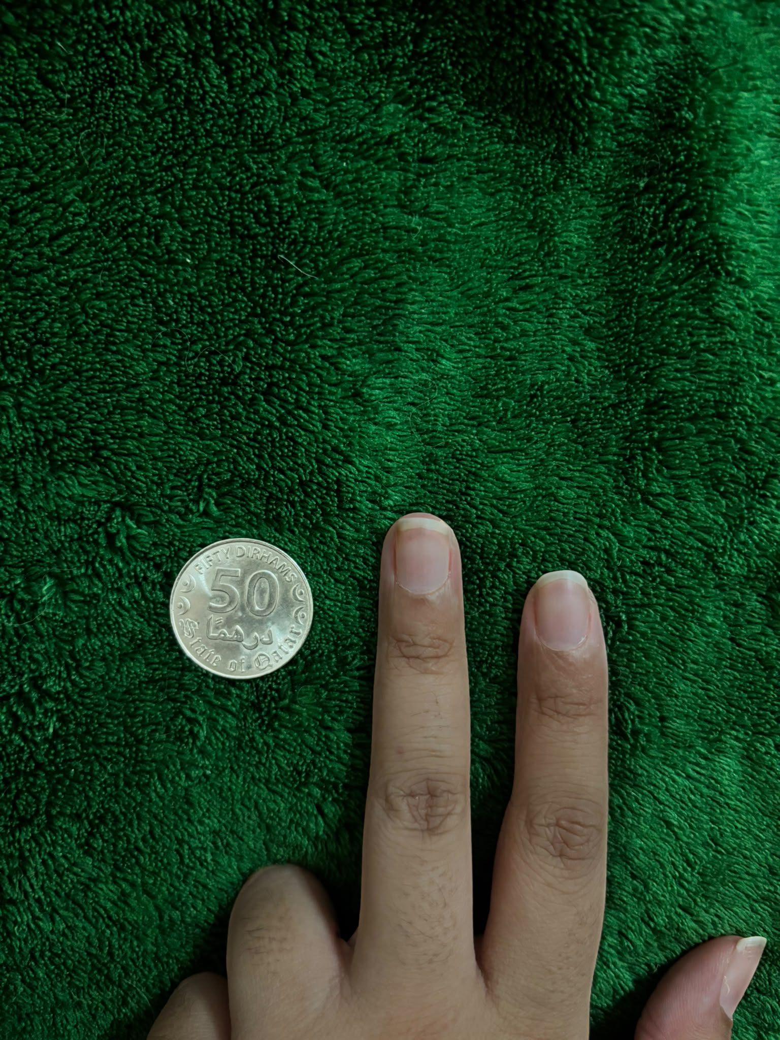 Sizing reference photo 2 — two fingers